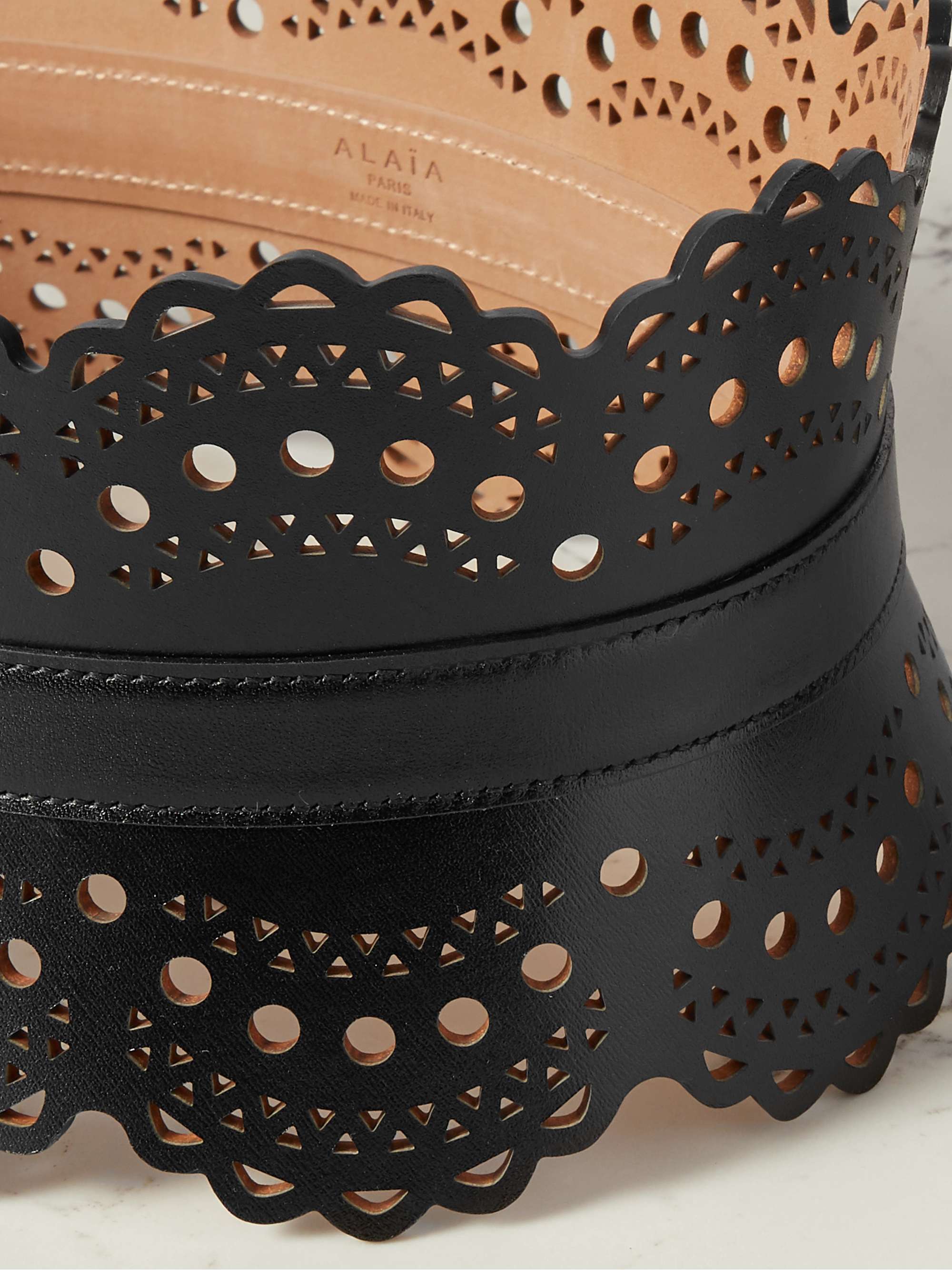 ALAÏA Laser-cut leather waist belt