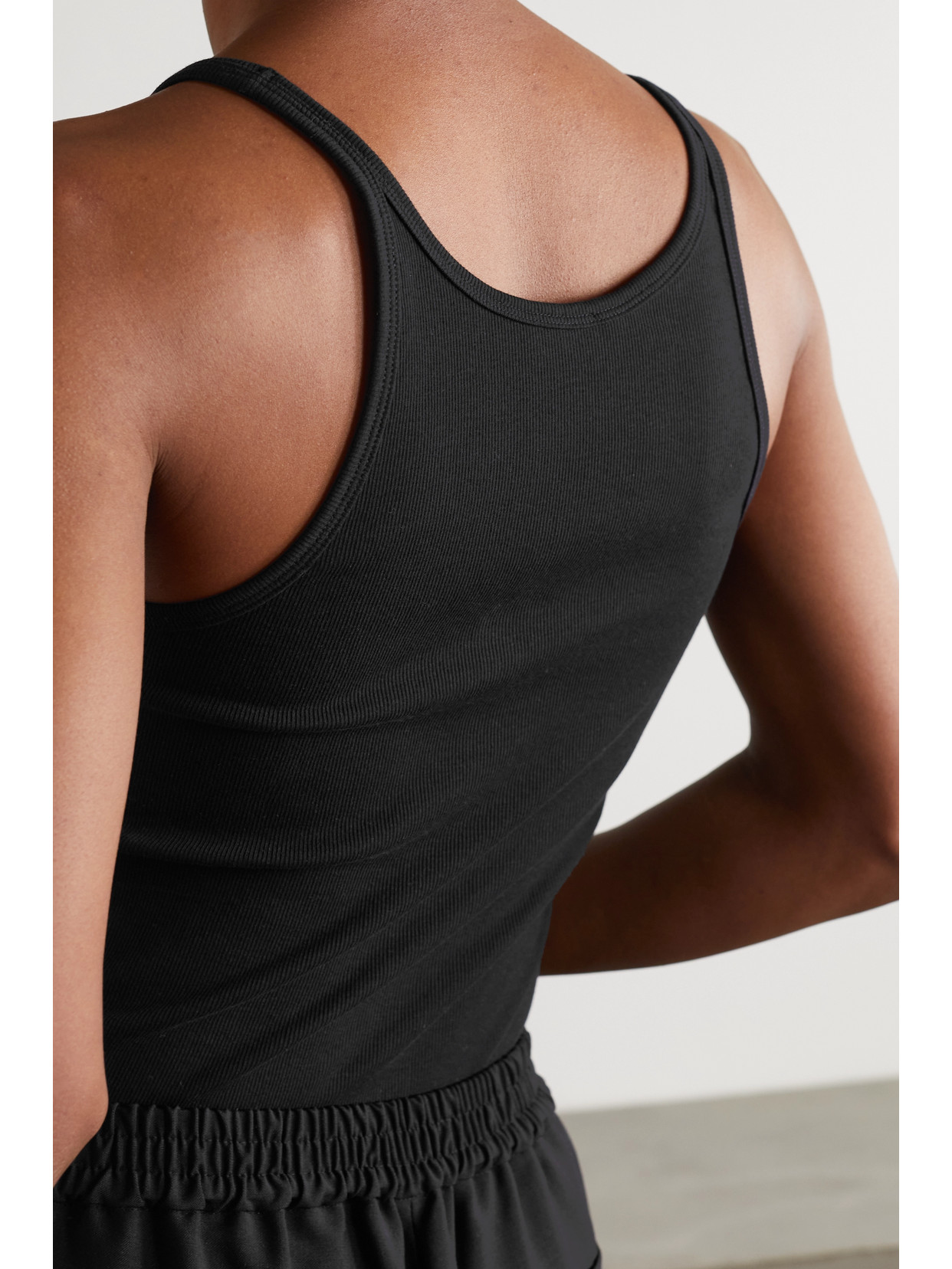 Shop Totême + Net Sustain Ribbed Stretch Organic Cotton-jersey Tank In Black