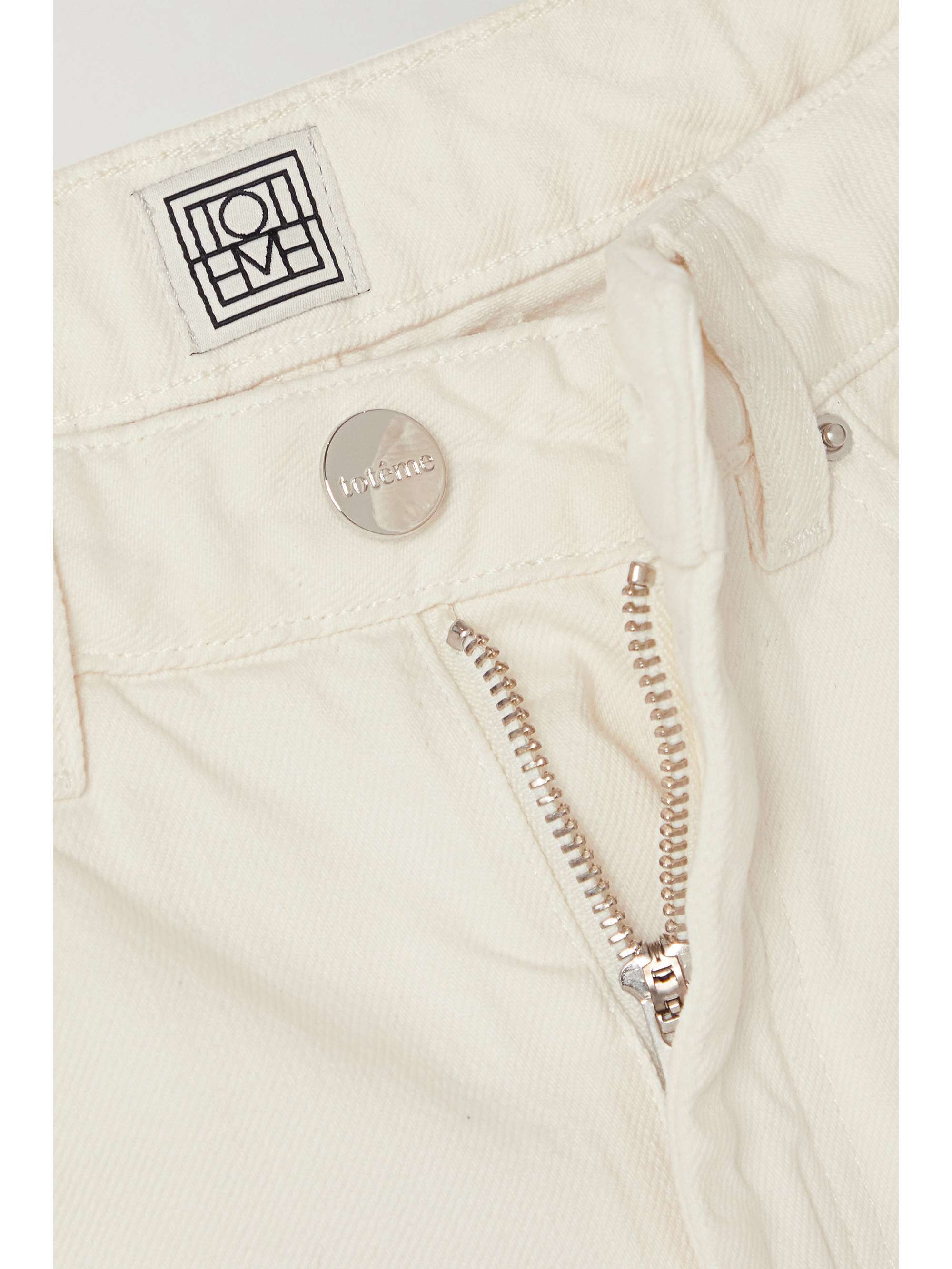 TOTEME High-rise tapered jeans