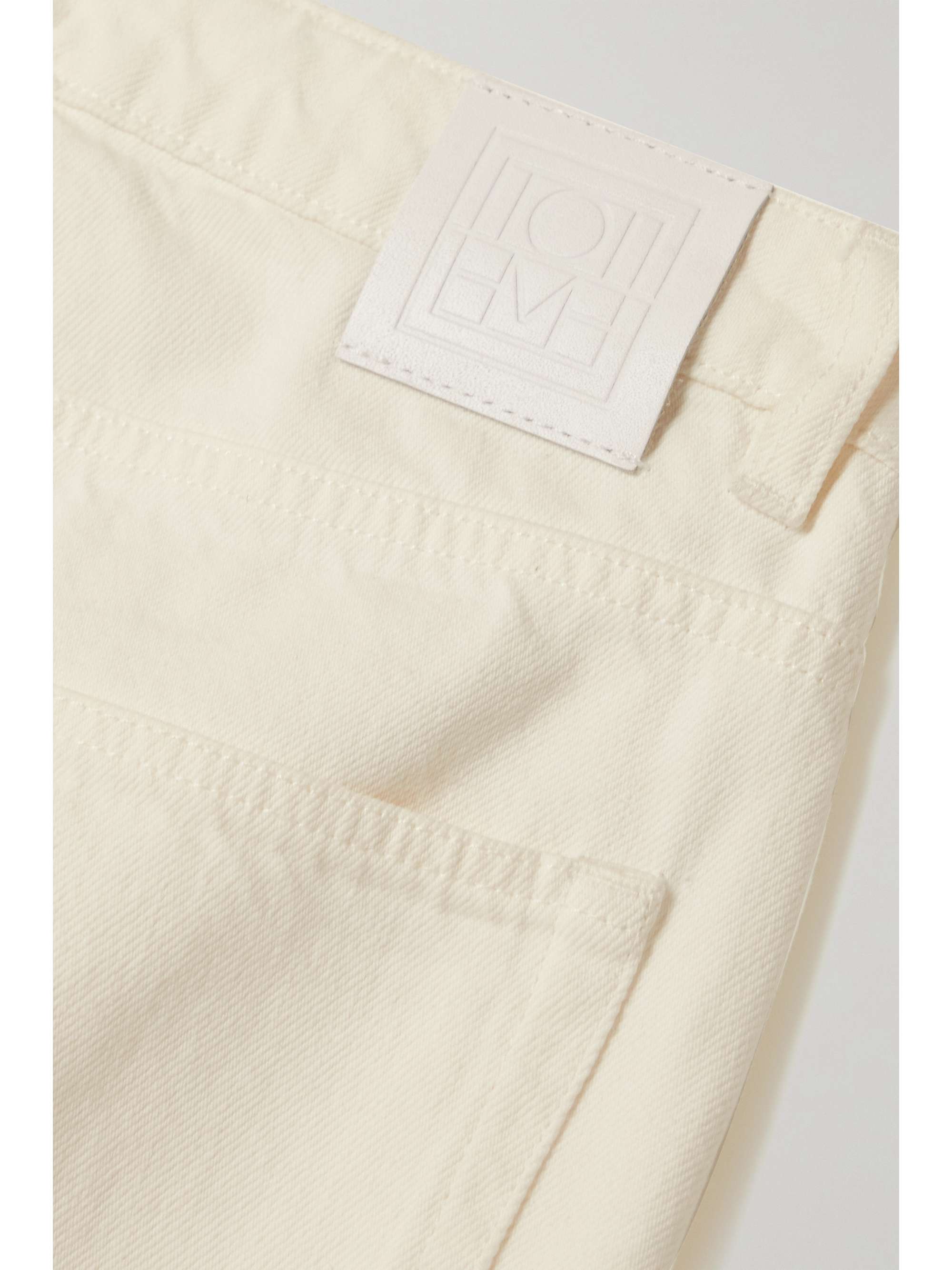 TOTEME High-rise tapered jeans
