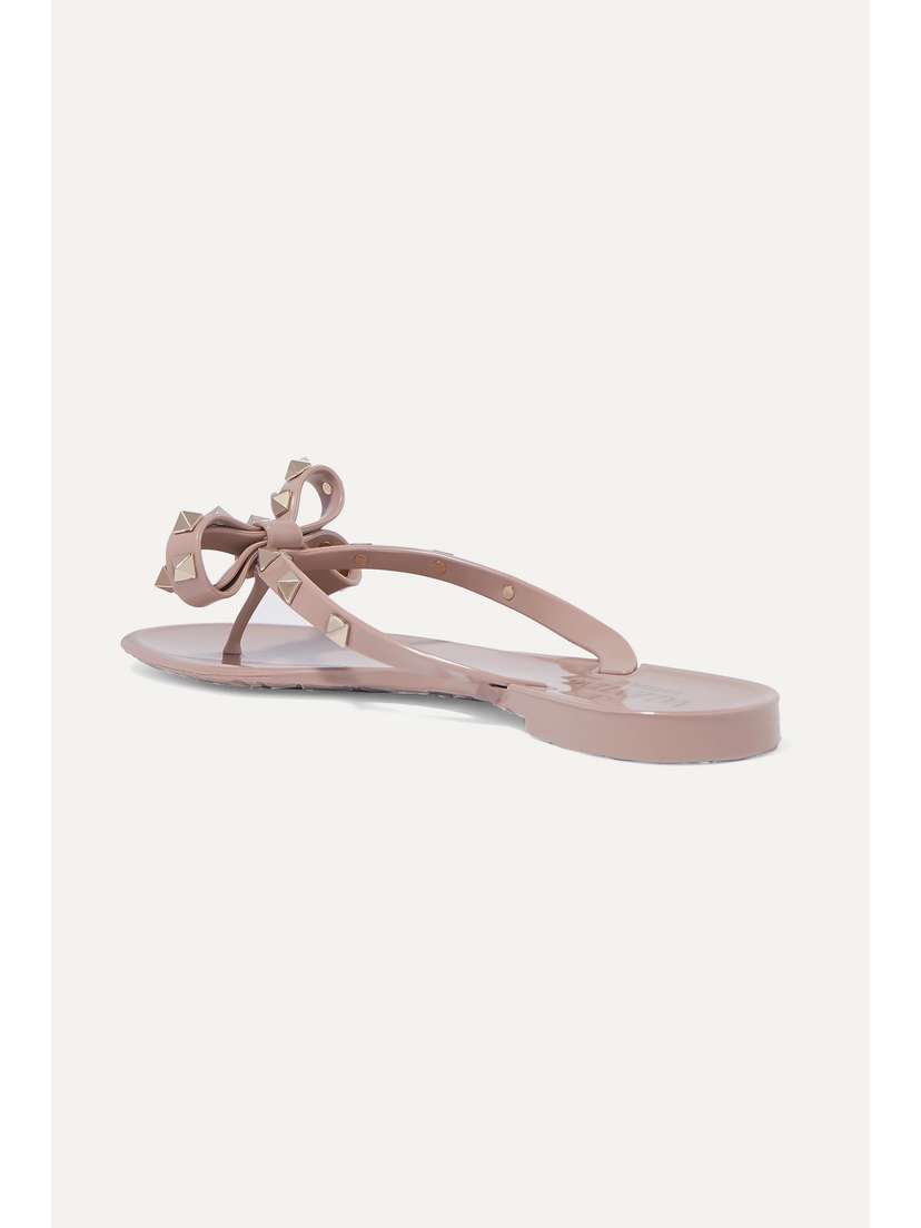Valentino Garavani The Rockstud Rubber Flip Flops - side view in Pink